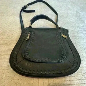 Beautiful black faux leather saddle purse with handle and strap
